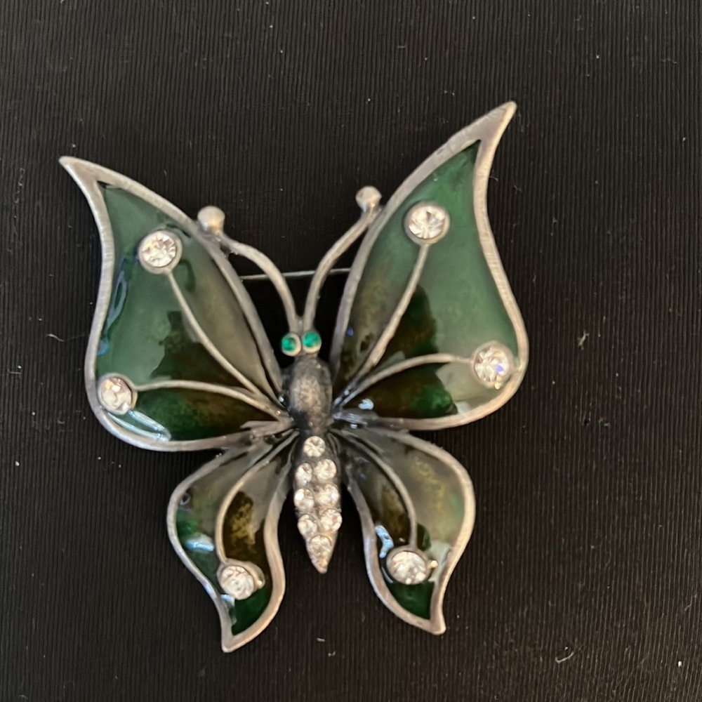 Two enamel pins in new condition!